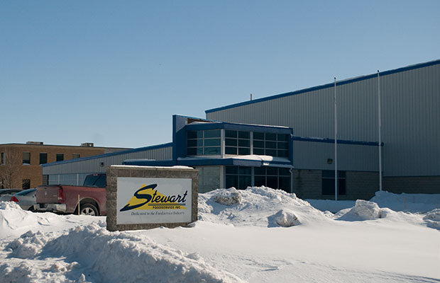 The Stewart Foodservice building, with the company sign at the entrance